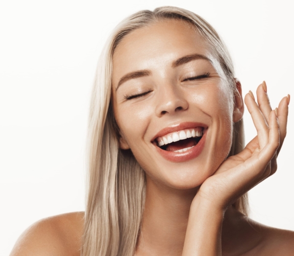 Portrait of a young blond woman smiling